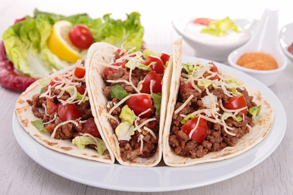 beef tacos with salad and tomato