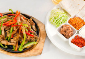 original fajita sizzling smoking hot served on iron plate and fresh vegetables on background ,MORE DELICIOUS FOOD ON PORTFOLIO